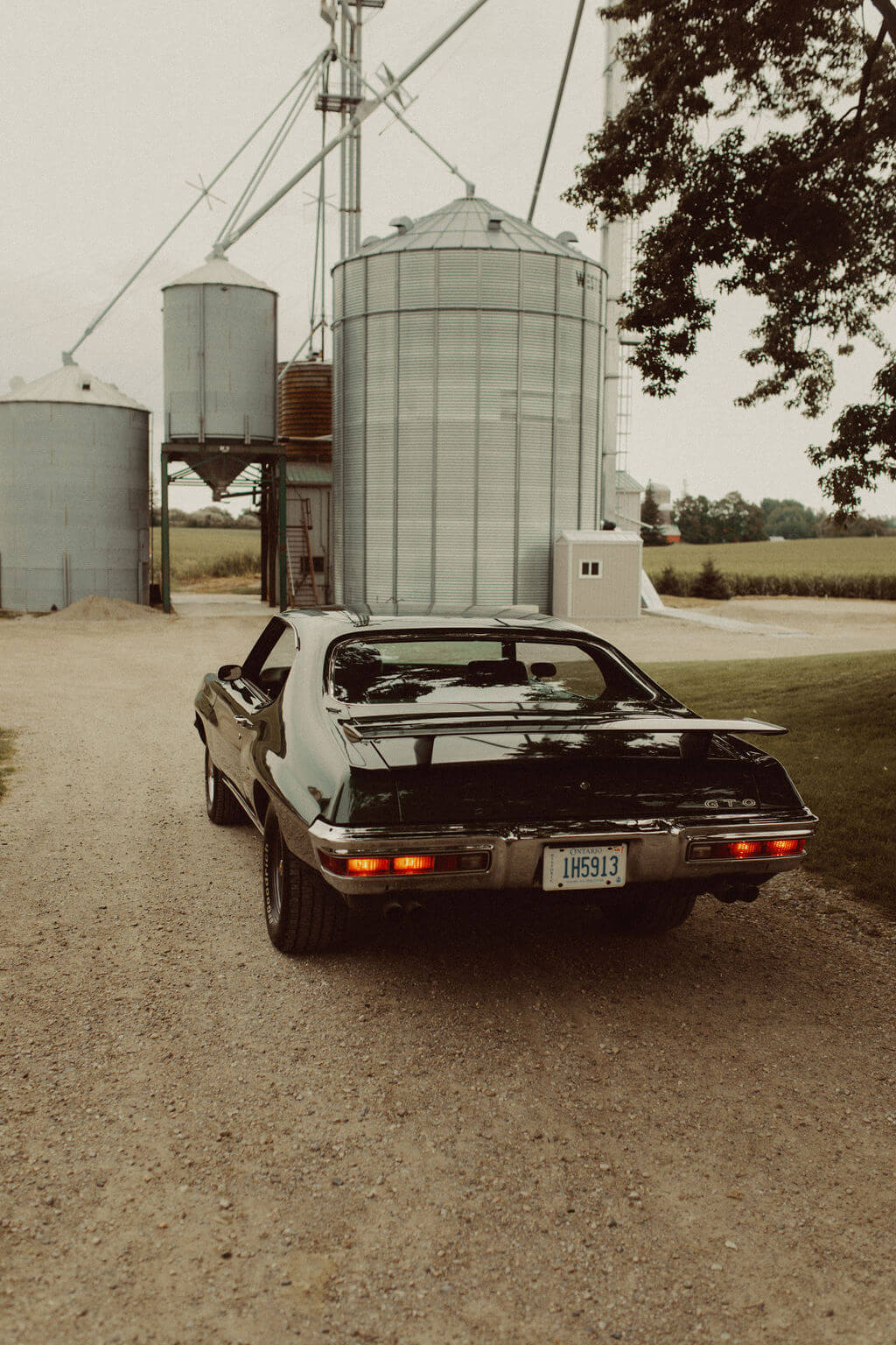 Classic car at farm wedding venue