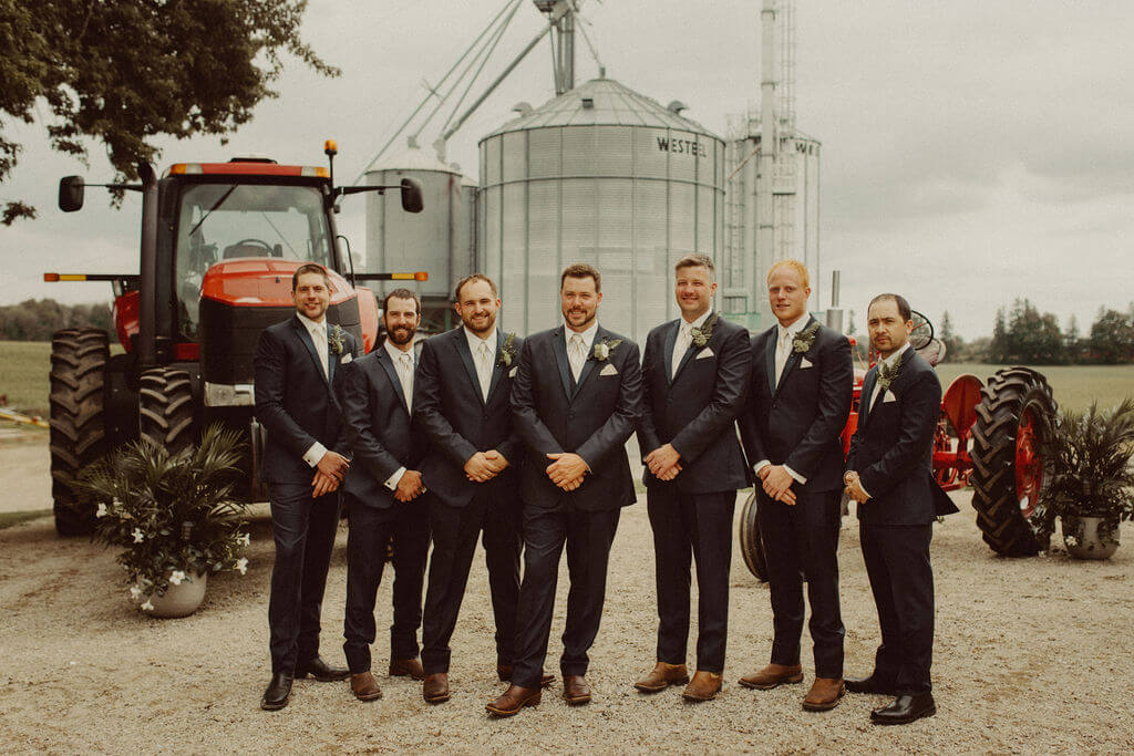 Groomsmen portraits at farm wedding
