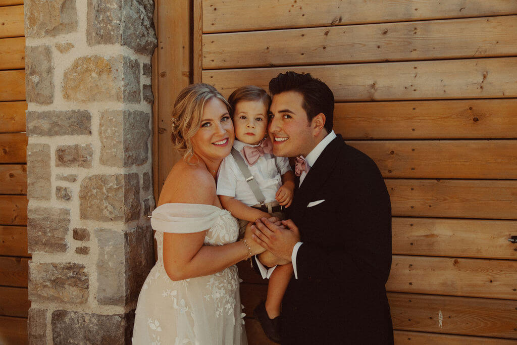 Bride and groom couple portraits with toddler son